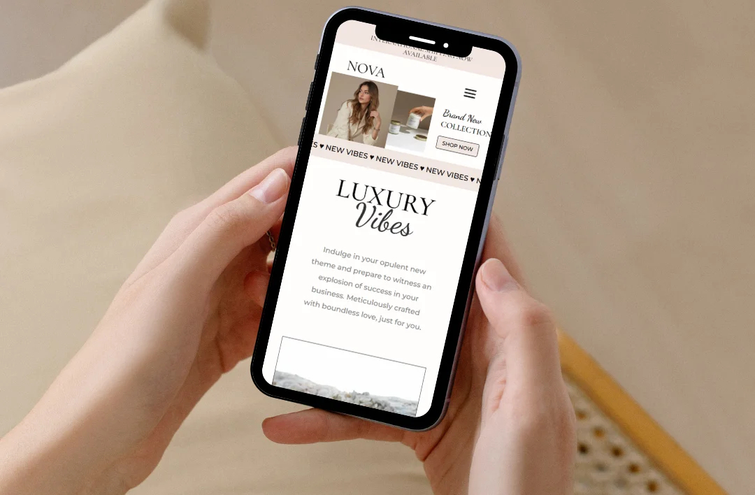 Mobile responsive clothing eCommerce website displayed on smartphone featuring fashion homepage layout and WooCommerce design