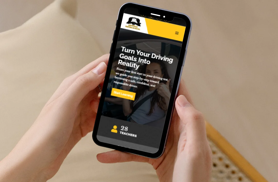 Smartphone par driving school website ka mobile-friendly version. Is mein school ka logo "Driveway Driving School" aur aik asaan navigation menu dikhaya gaya hai, jo ye zahir karta hai ke website mobile screen par kitni safayi se nazar aati hai.