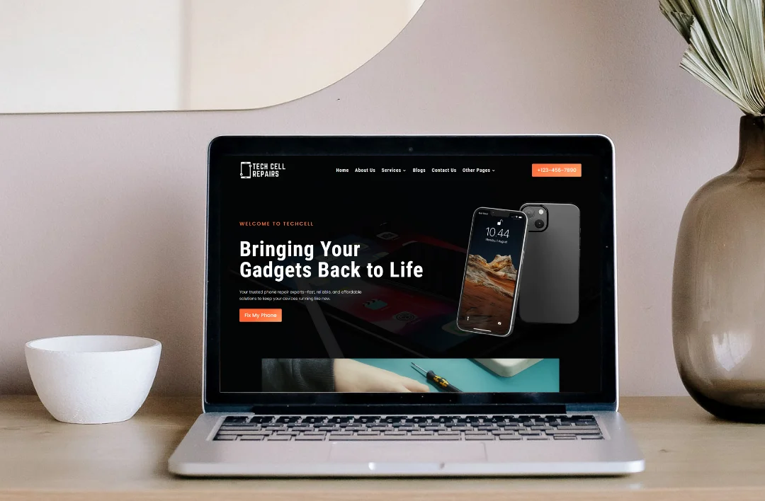 "A modern laptop mockup on a wooden desk displaying the 'GoClean' mobile repair website. The screen features a bold hero section with the headline 'We Provide Premium Repair Services' and high-quality images of technical staff, designed for high conversion on desktop browsers."