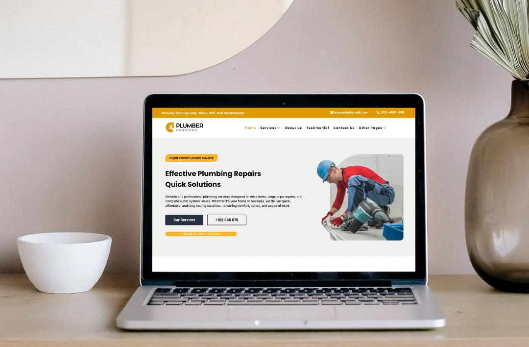 "A modern laptop mockup featuring the professional 'Plumber' website template. The screen displays a high-contrast yellow and slate grey theme with a photograph of a plumber at work. It features the headline 'Effective Plumbing Repairs & Quick Solutions' alongside clear 'Book Session' and 'Call Now' buttons. The laptop is set on a clean wooden desk next to a minimalist white bowl and vase."