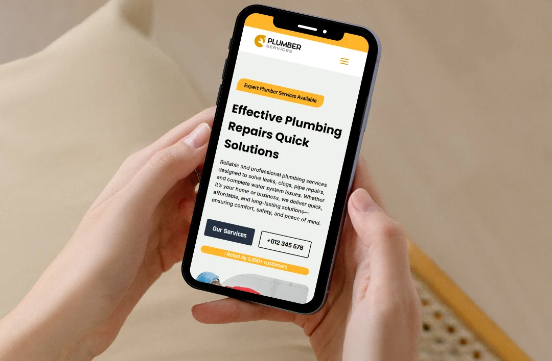 "A close-up of a smartphone displaying the mobile-responsive 'Plumber' website template. The screen features a bold yellow and white theme with the headline 'Effective Plumbing Repairs Quick Solutions.' It prominently showcases action buttons for 'Our Services' and a direct 'Call Now' phone number, optimized for emergency plumbing leads."