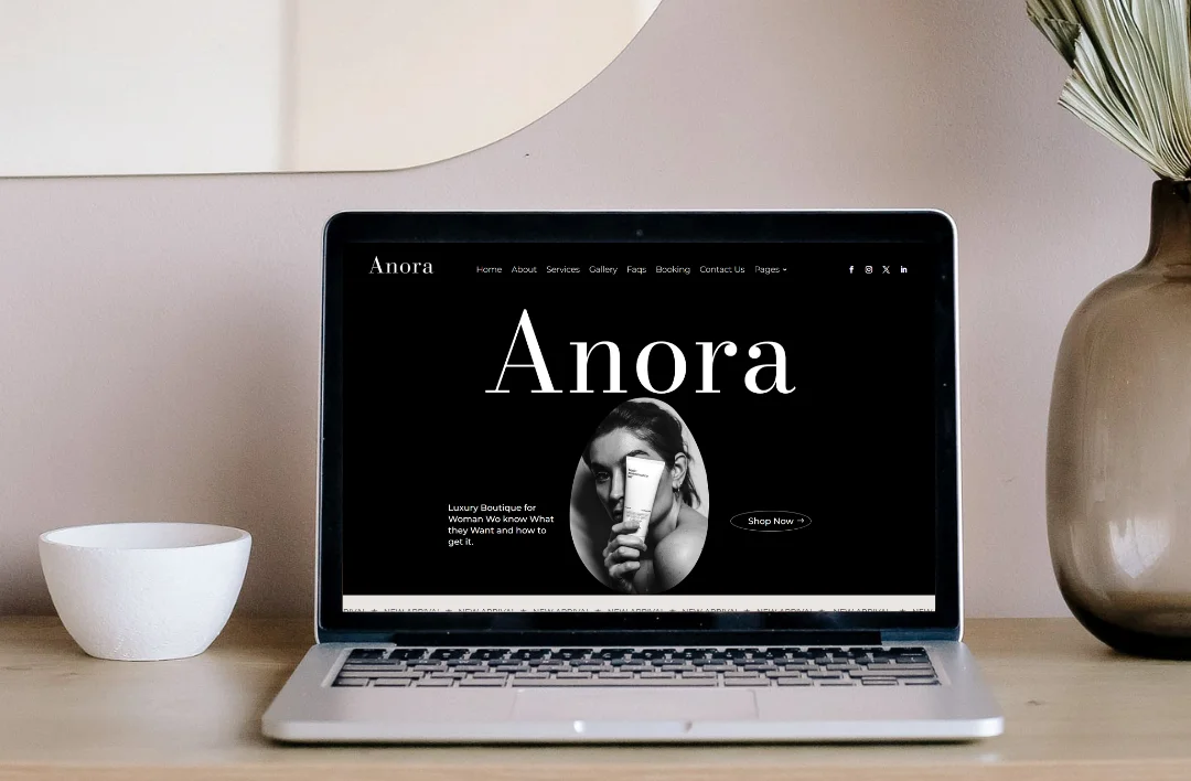 Skin Divi theme homepage displayed on laptop screen featuring fashion collection layout and WooCommerce shop design